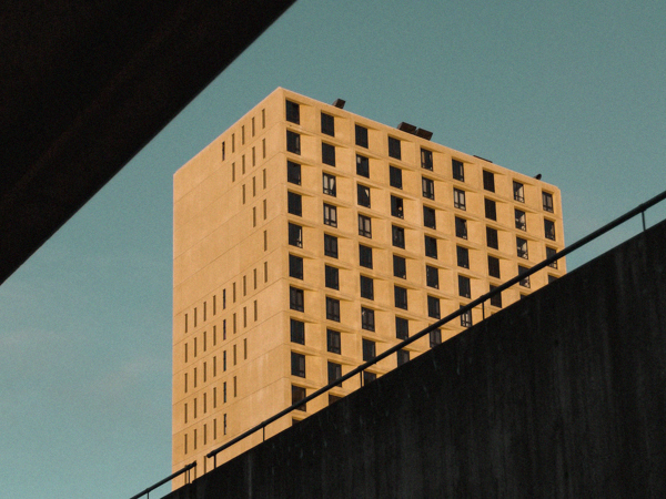 The top of a high rise building. 